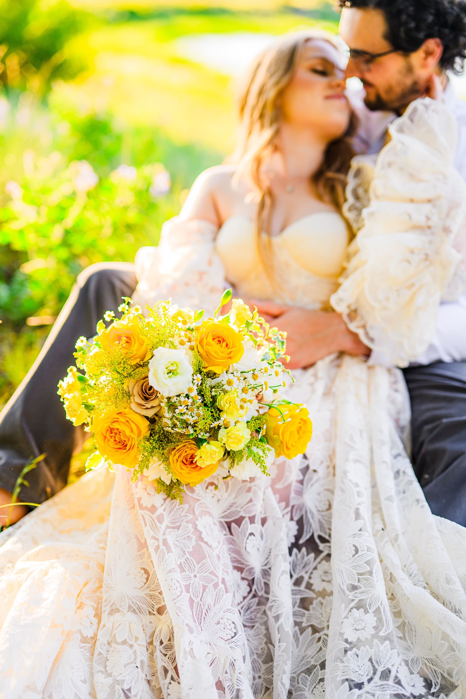 Bride and groom with floral bouquet