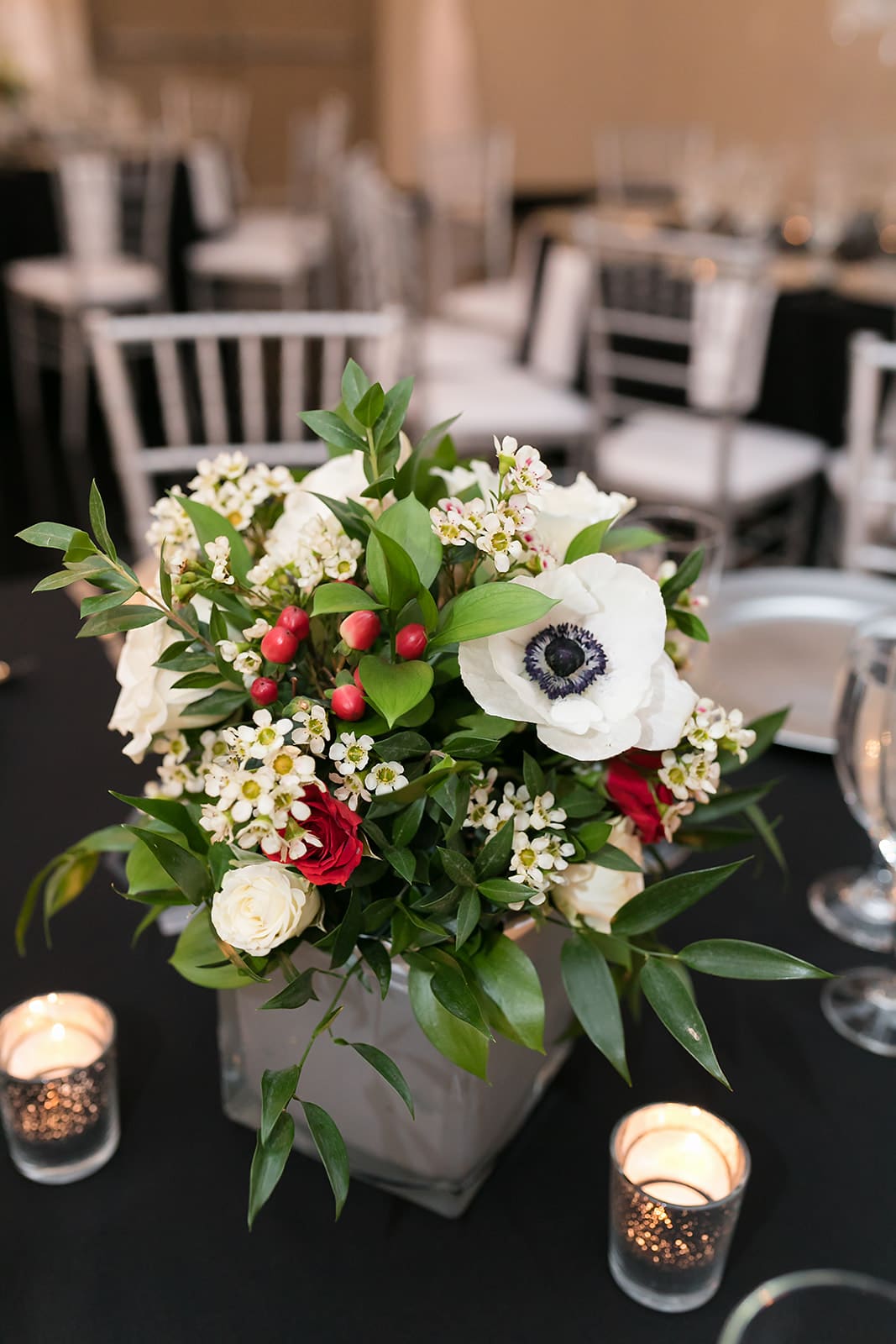 Bride and groom with floral bouquet